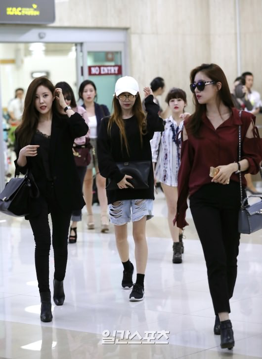 T-ara顺利抵达韩国 时尚装扮抢镜