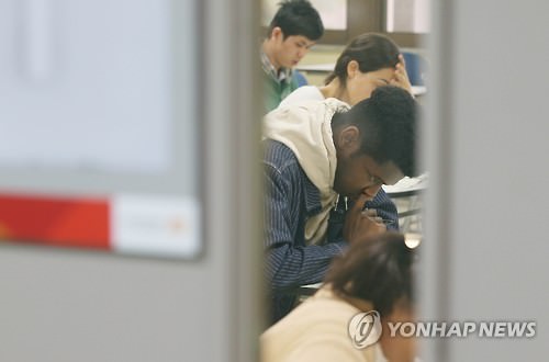 资料图片：韩国语能力考试现场（韩联社） knews@yna.co.kr