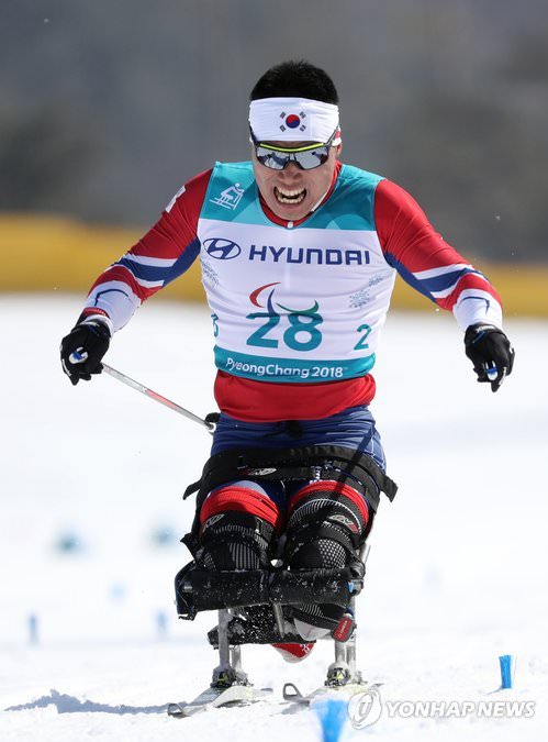 平昌冬奥铜牌得主鼓励残疾人挑战极限