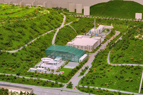 回收利用垃圾填埋场里的沼气设施(图片为模型图)